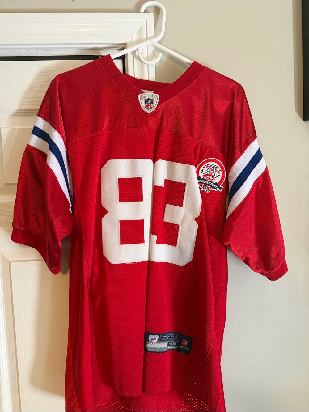 Reebok Red Men's #83 Football Jersey with Blue & White Sleeve Stripes